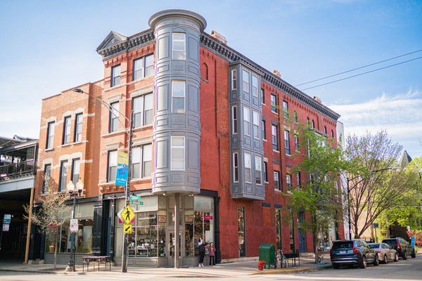 A photo of the Chicago boutique Art Effect on the first floor of a four-story building in Chicago's Lincoln Park Neighborhood.