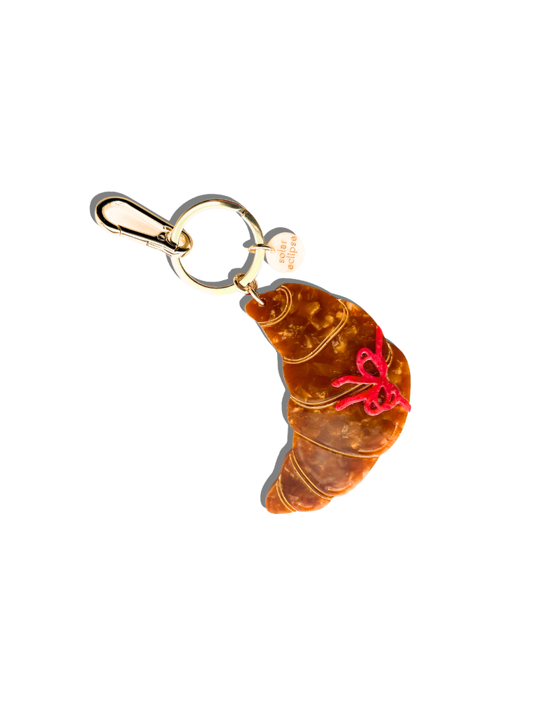 CROISSANT BOW BAG CHARM